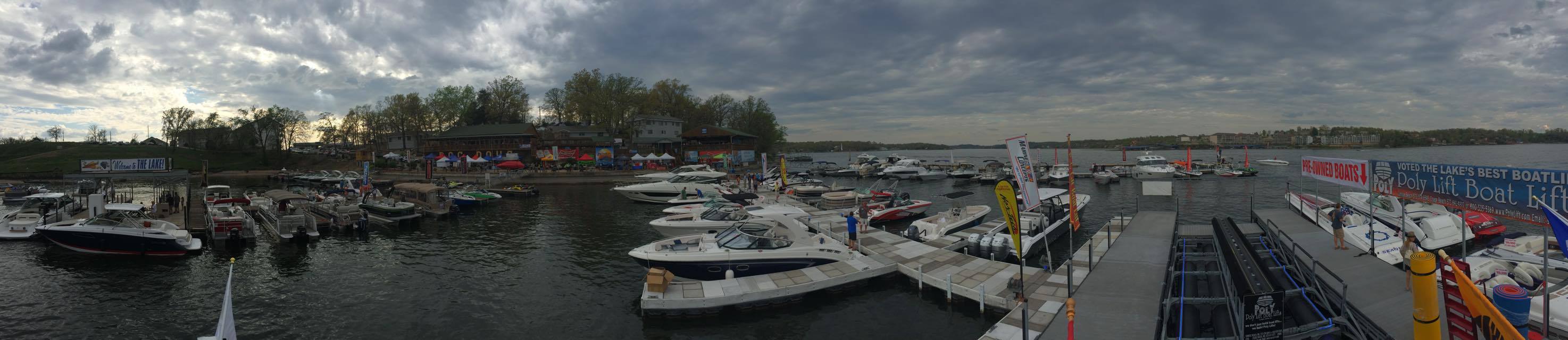 Wide photo of boats as a dock with Polylift sign in the right corner