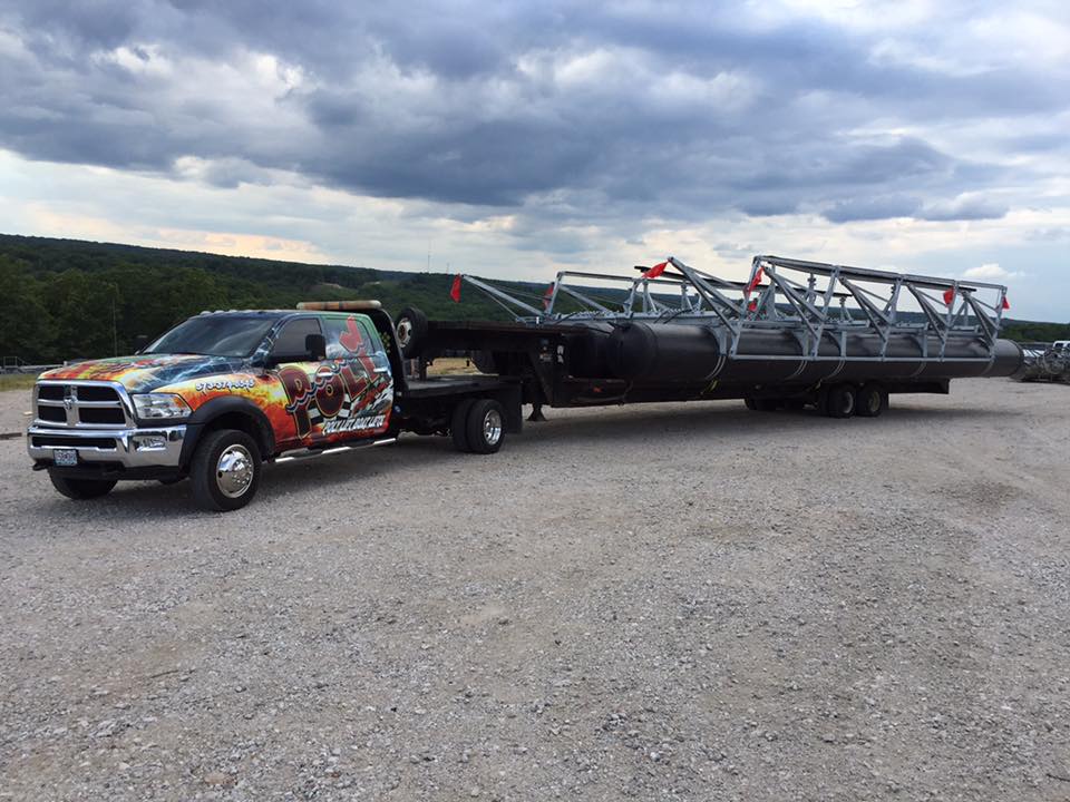 Photo of a PolyLift being transported by a truck