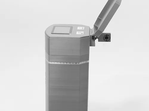 The Poly Lift ICON 1 (1 outlet/hose) is a tall, rectangular gray bin with a partially open lid, featuring 24/7 lift position monitoring. A sensor is attached near the top, and visible labels are on the lid. Background is plain and light-colored.