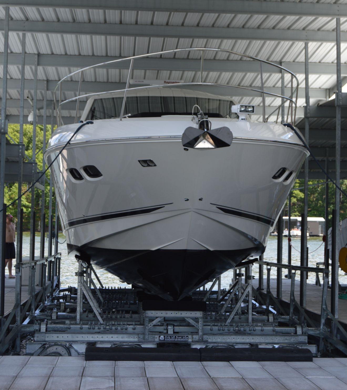 Photo of the front of a boat on a boat lift