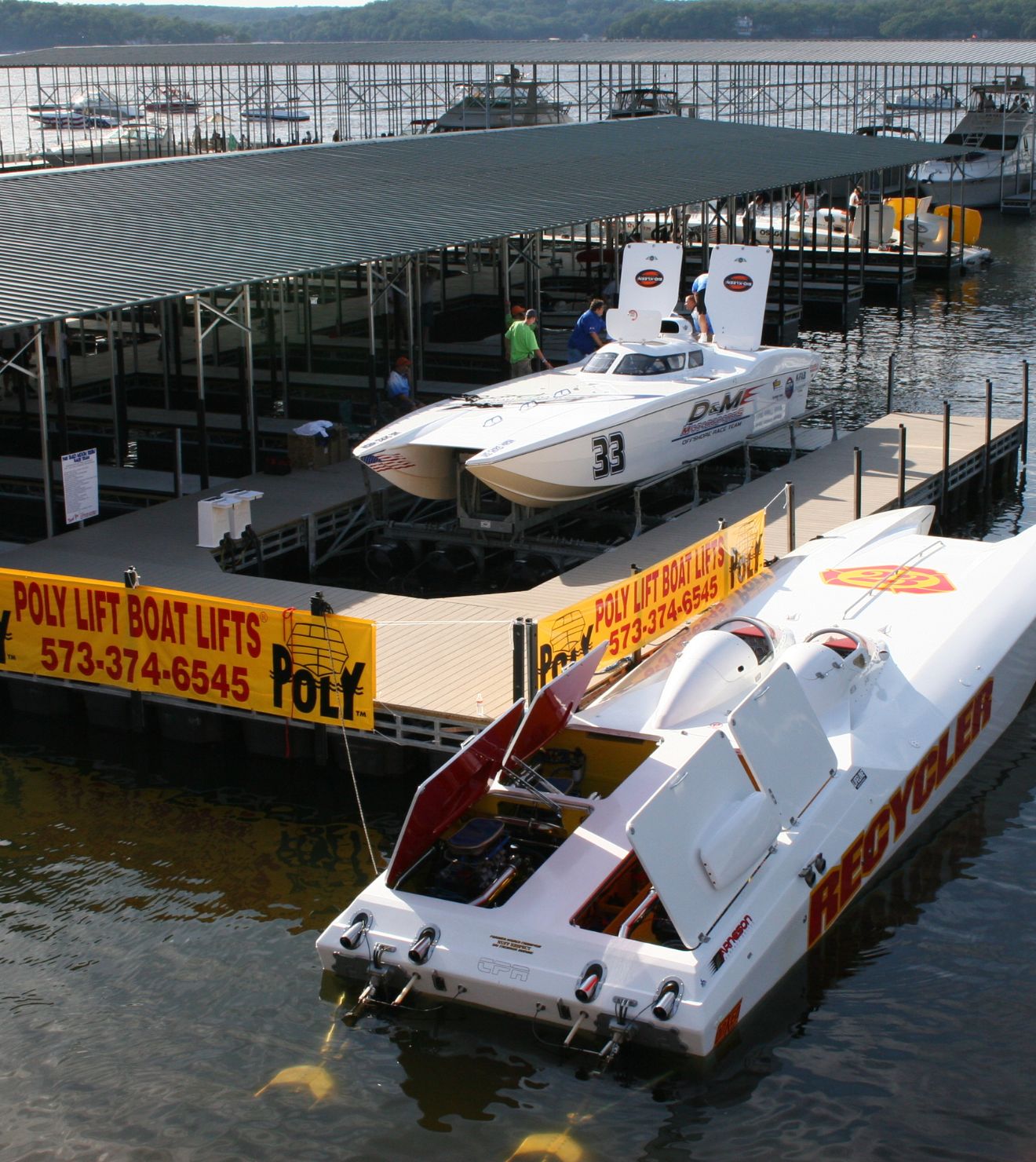 White boat sitting on a PolyLift Boat Lift